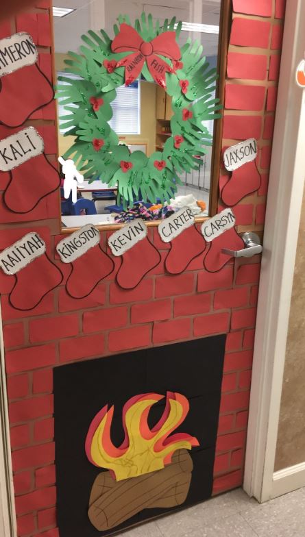 Stockings on the fireplace Christmas decoration for a classroom door